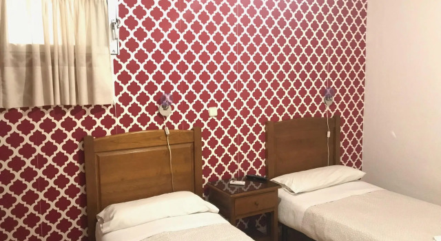 Трёхместный номер Hostal Los Perales