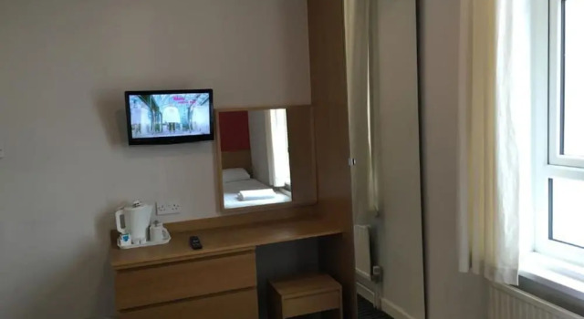 Økonomi- tredobbelt værelse OYO Wave Crest Hotel