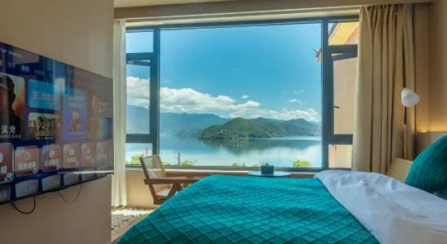 Семейный люкс Дуплекс с 2 комнатами с видом на озеро Lugu Lake Scenic Area Xingye · Yunshanwang Homestay