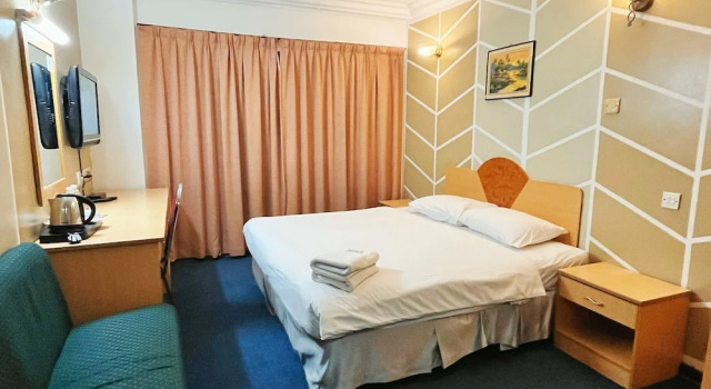 O podwyższonym standardzie dwuosobowy pokój Fair Park Hotel
