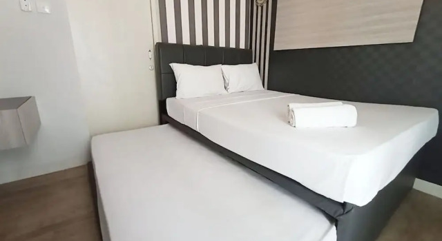 Homey And Cozy Living Studio Amartha View Apartment