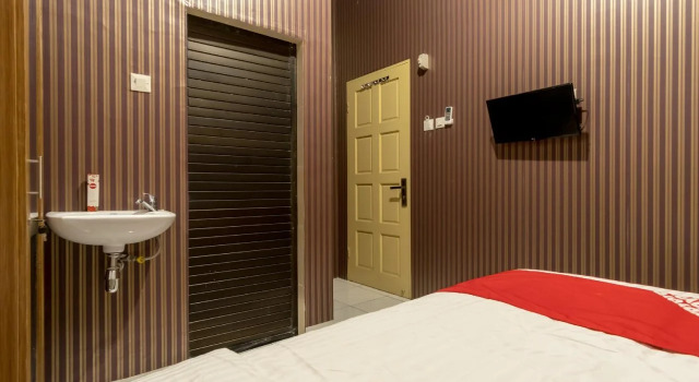 Executive Inn By OYO Rooms, Rezervovat Hotel Hotely v Medan s parkováním, Parkování