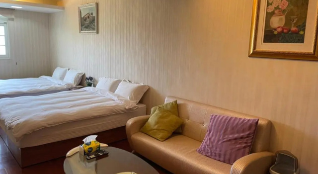 Четырёхместный номер Standard с балконом Jiao Xi Yi Dou Hot Spring B&B(礁溪伊豆溫泉民宿)