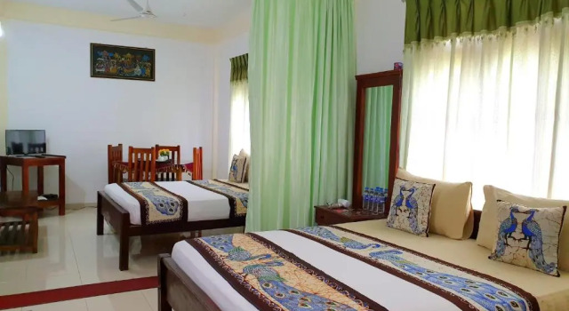 Четырёхместный номер Economy New Peacock Resort