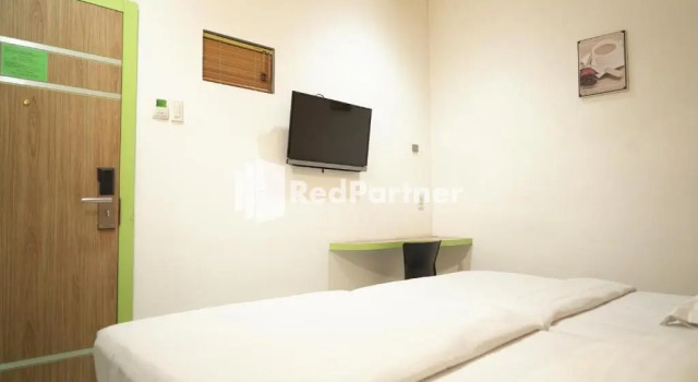 Двухместный номер Deluxe Wisma Sederhana Medan Mitra RedDoorz