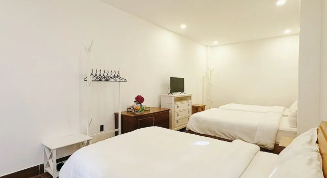Кровать в общем номере TTR Joy Apart Hotel