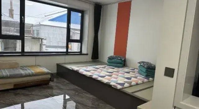 Кровать в общем номере Sanyi Leisure Resort Homestay (Wusong Island Scenic Area)