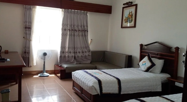 Кровать в общем номере Ocean Star Hotel
