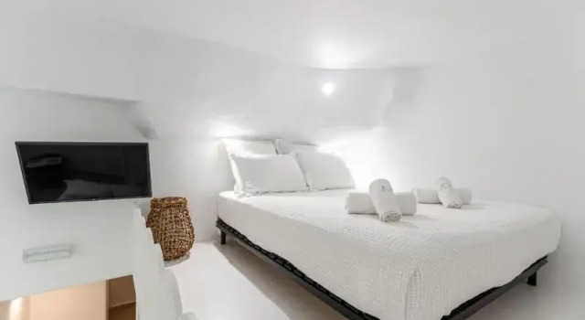 Кровать в общем номере Majo Suites Hotel