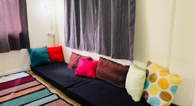 Кровать в общем номере Baan Mae Somkid Homestay