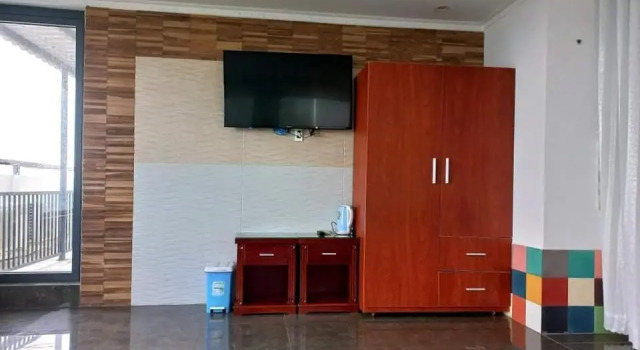 Кровать в общем номере Ninh Chu Hotel