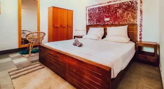 Кровать в общем номере с балконом и с видом на город Hummus Hostel Hikkaduwa