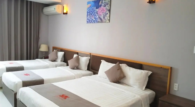 Четырёхместный номер Deluxe Khách sạn San Hô Vũng Tàu