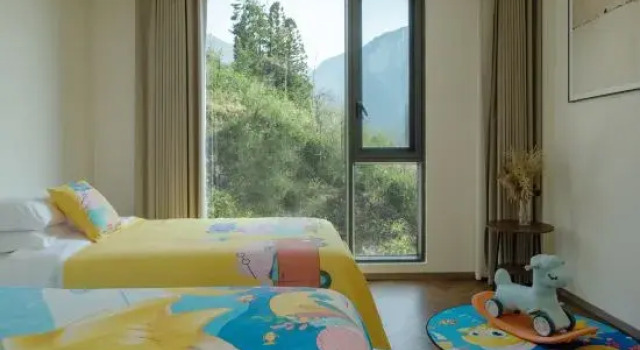 Люкс с 2 комнатами Enshi Jiujiu Homestay (Grand Canyon Tourist Center Store)