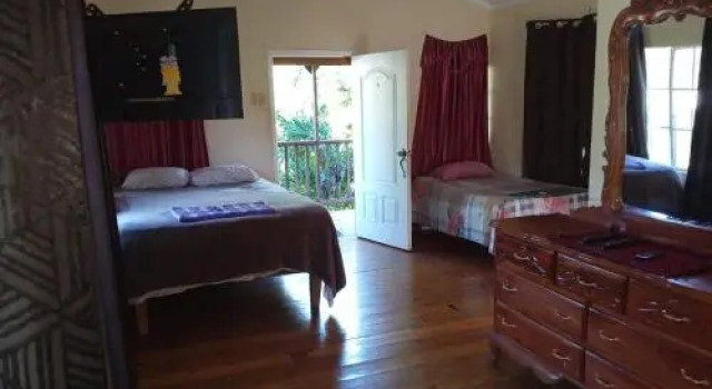 T&T - Tatty and Tony Guesthouse, Rezervovat Hotel Levné hotely v Negril