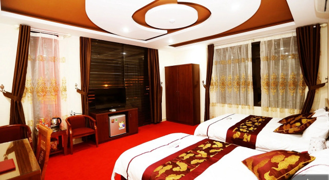 Трёхместный номер Tiamo Hotel Ha Giang
