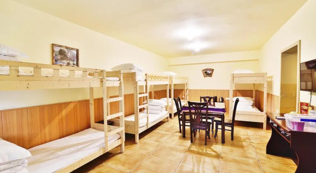 Кровать в общем номере Country Utopian Inn