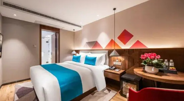 Люкс Qujing Ouduo Hotel (Qilin District South City Store)