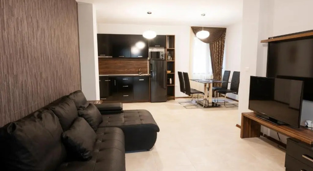 Апартаменты Цокольный этаж c 1 комнатой Green Paradise Deluxe Apartments