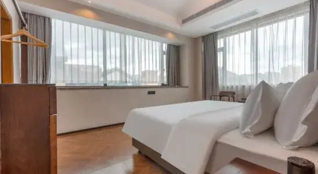 Люкс Premium Douzhou Courtyard Hotel (Maoming Xinyi Douzhouli Cultural and Creative Street)