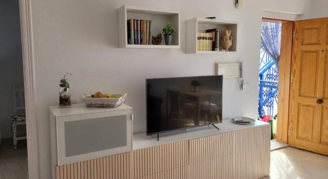 Апартаменты Apartamento con terraza y piscina a 300m de playa