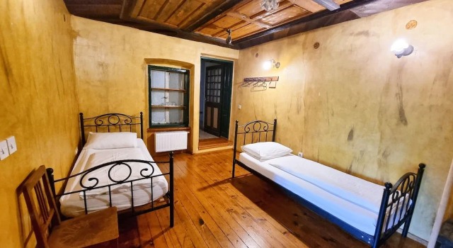 Кровать в общем номере B&B Pod Skalo