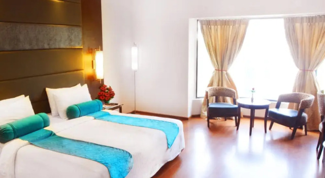 Двухместный люкс с видом на город Ashraya International Hotel
