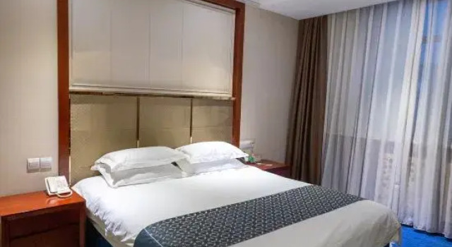 Люкс Deluxe Mingshihui International Hotel (Cultural Plaza Municipal Government Branch)