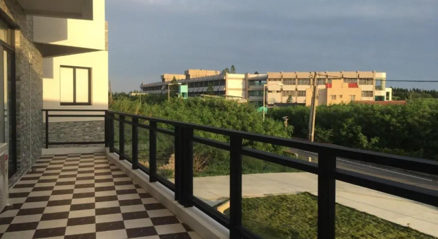 Camera quadrupla Standard con balcone Destination Inn