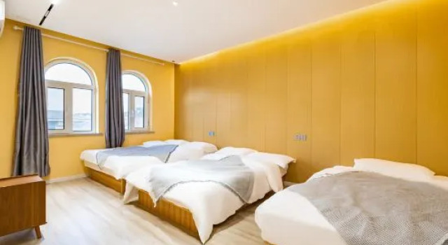 Кровать в общем номере Sanmengji Ganhai Holiday Courtyard (Laoshan Scenic Spot Branch)