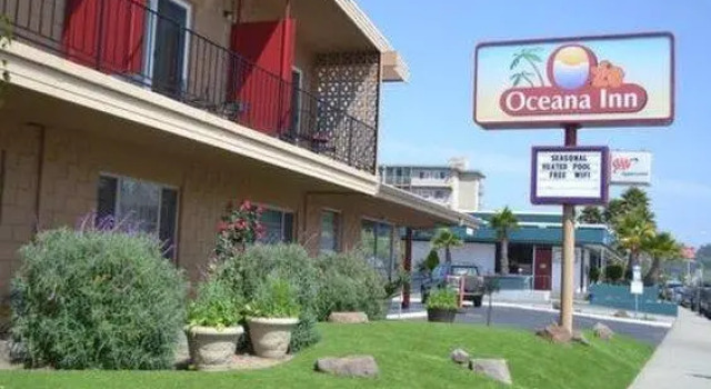 Кровать в общем номере SeaSide Inn & Suites