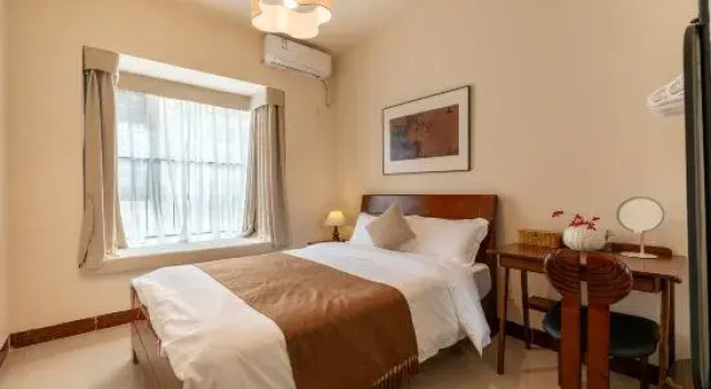 Люкс с 4 комнатами Ludao Designer Hostel (Provincial Museum & Riyue Square Duty Free Shop)