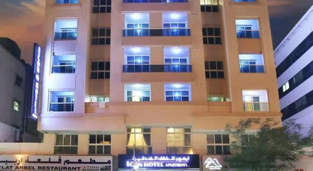 Кровать в общем номере Icon Hotel Apartments