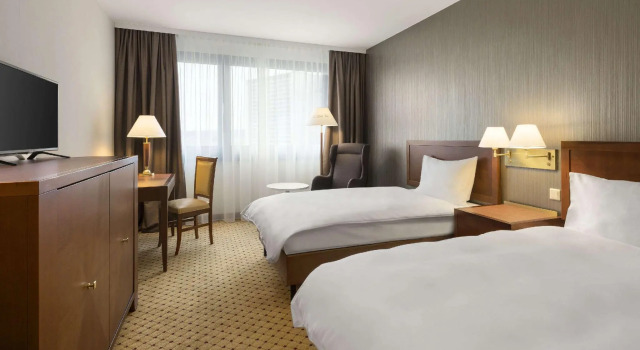 Четырёхместный номер Standard Hotel Ramada by Wyndham Graz