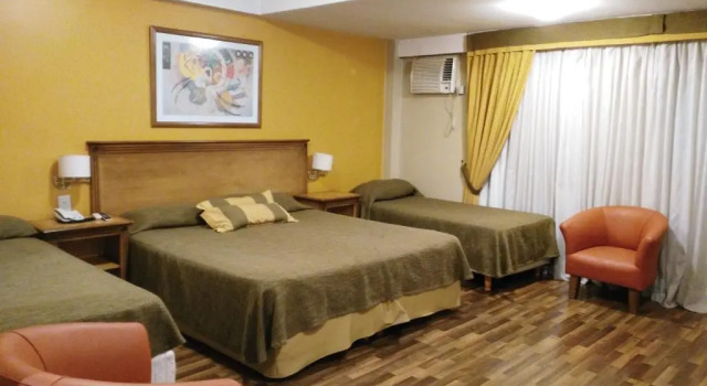 Четырёхместный номер Standard Tritone Hotel