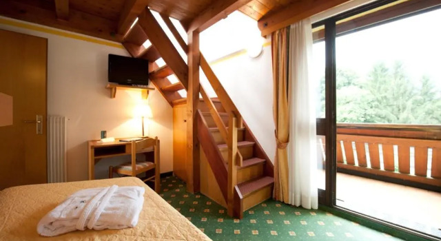 Трёхместный номер Standard Дуплекс Centro Pineta Family Hotel & Wellness