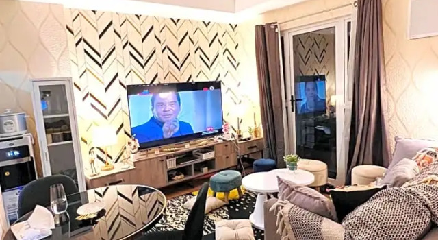 New Cozy 2 bedroom unit condotel for staycation with living room and kitchen set with pool, Забронировать Отель Кайнта Лусон