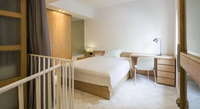 Номер Deluxe Дуплекс с балконом The Tropical Residence Serviced Homestay
