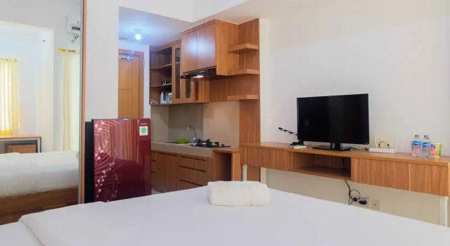 Brand New Compact Studio The Nest Puri Apartment By Travelio