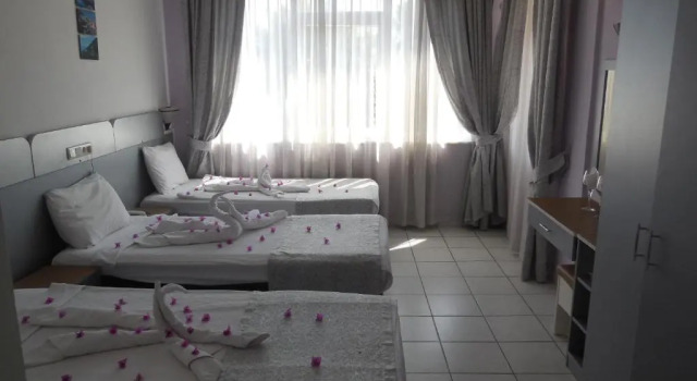 Четырёхместный семейный номер Standard Resitalya Hotel