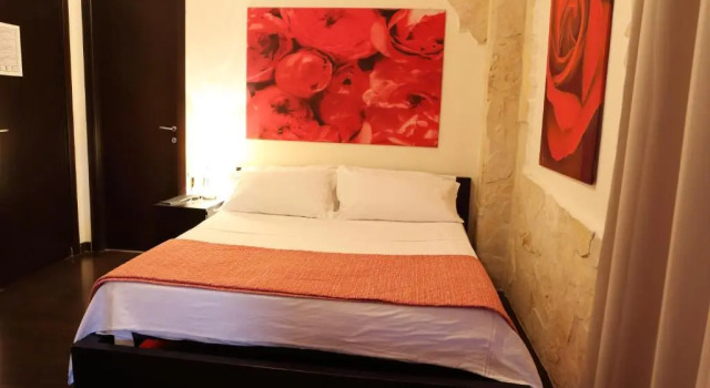 Четырёхместный номер Standard Michelangelo Etna Hotel