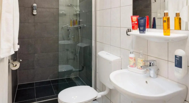 Номер Standard Pension Domblick