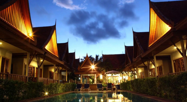 Кровать в общем номере Bangtao Village Resort - SHA
