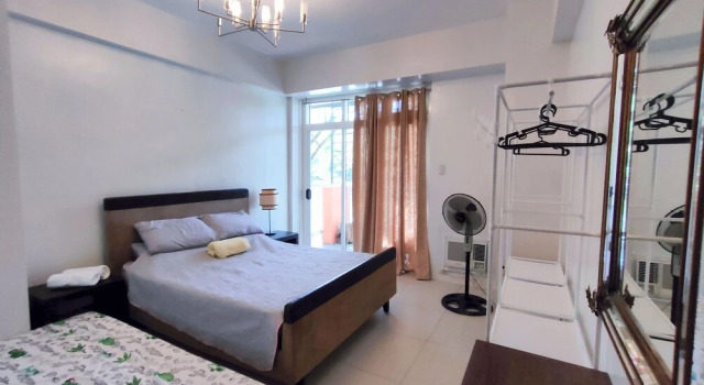 Dr Calayan's 2BR Condo at Pico De Loro, Забронировать Отель Назугбу 