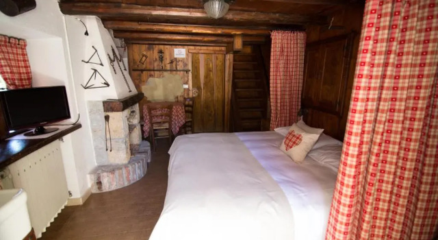 Habitación cuádruple Estándar con vista al jardín Hotel Edelweiss
