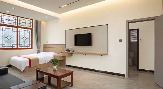 Семейный люкс Tengchong Jianlan Business Hotel