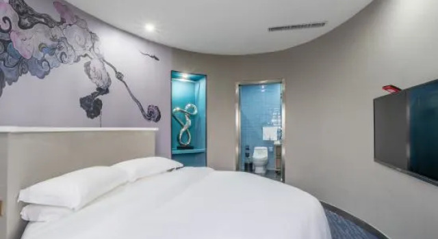 Люкс Deluxe Wutong Boutique Theme Hotel (Nanyang Wollongong Railway Station)