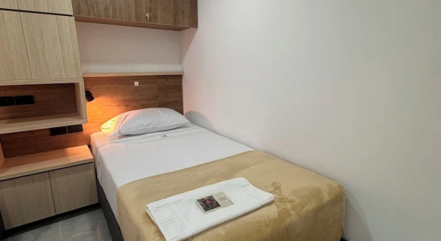 Кровать в общем номере Vida Hostel