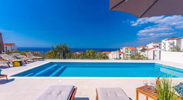 Вилла Villa Diva with 7 bedrooms, heated pool, sauna and fun zone, sea views