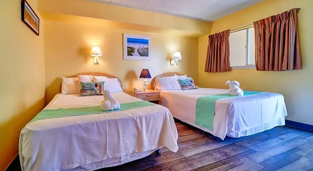 Двухместный люкс с балконом и oceanfront Acacia Beachfront Resort